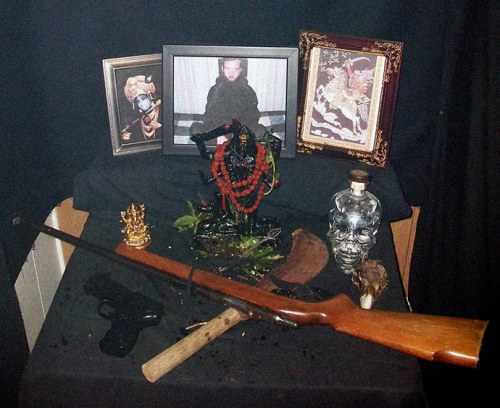 Photo of weapons and other offering to the Hindu Goddess kali at Joshua Sutters rural South Carolina property. Titled “Their Lordships Shree Shree Kalki-Kalaratri , New Bihar Mandir, United States”, the photo is taken from the official New Bihar mandir temple website and posted in 2009