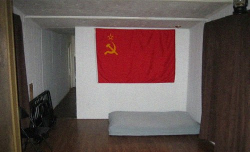 Photo of hammer and sickle flag inside the RPP headquarters in rural Lexington County South Carolina