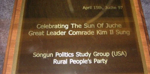 A plaque presented by the Rural People’s Party and Songun Politics Study Group to Kim Jong Il on Kim Il Sung’s birthday